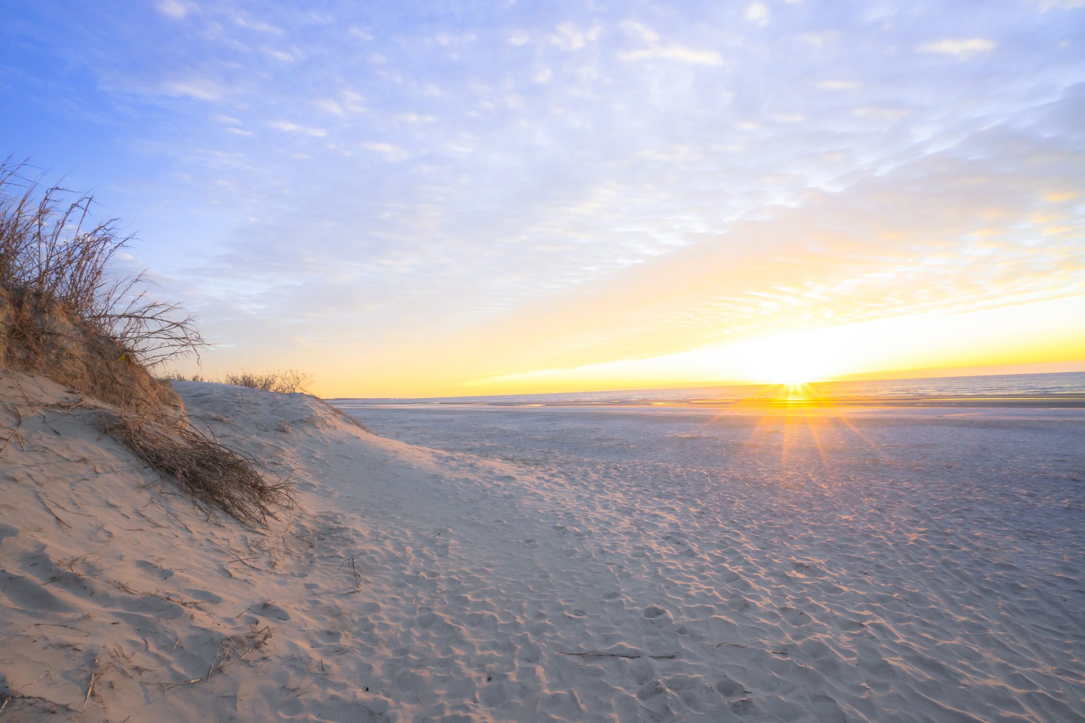 A sunny beach near Charleston, SC. Get back to the outdoors with fitness training from NJB Training.