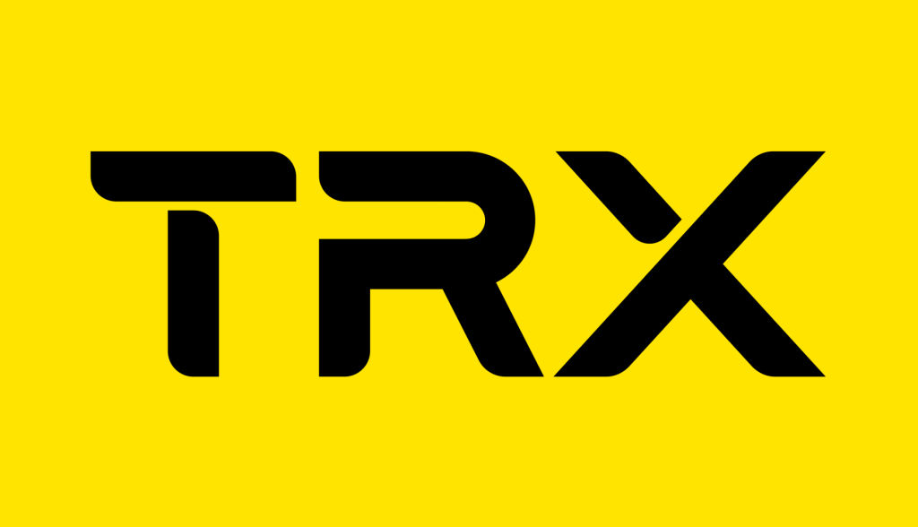 TRX logo in black letters on yellow background representing suspension training equipment used by NJB Training in Mount Pleasant, SC for functional workouts.
